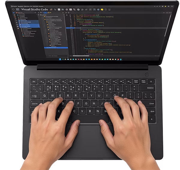 Developer working on custom website code and responsive layout.